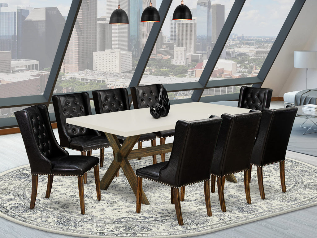 East West Furniture X727FO749-9 9 Piece Dining Room Furniture Set Includes a Rectangle Dining Table with X-Legs and 8 Black Faux Leather Parsons Chairs